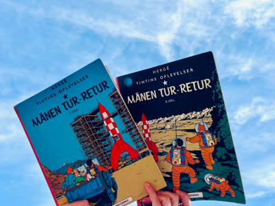 Forsiderne til de to Tintin tegneserie-album Månen tur-retur