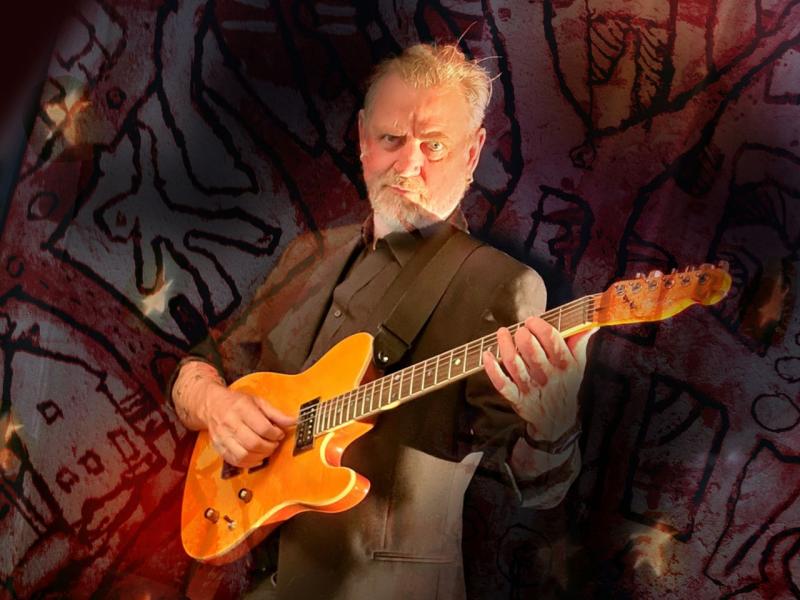 Peter Holst med guitar